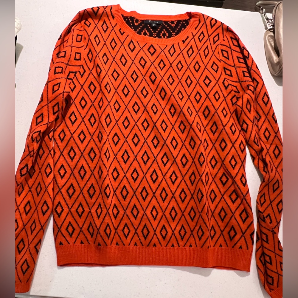Orange and black sweater